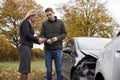 Two Drivers Exchanging Insurance Details After Car Accident Royalty Free Stock Photo