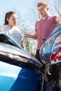 Two Drivers Inspecting Damage After Traffic Accident Royalty Free Stock Photo
