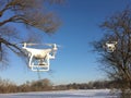 Two drones flying on the sky Royalty Free Stock Photo