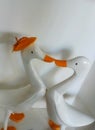 two duck statues on display made of white wood Royalty Free Stock Photo
