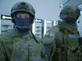 Two dummy in tactical clothing and helmets at the exhibition.