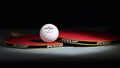 Two Dunlop table tennis bats and ball Royalty Free Stock Photo