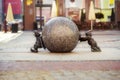 Two dwarfs pushing granite ball in Wroclaw, Poland. One of famous sculptures of dwarfs in Wroclaw, Breslau in past, symbols of Royalty Free Stock Photo