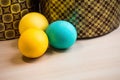 Two Easter cakes and three colored eggs, yellow and blue Royalty Free Stock Photo