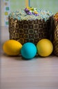 Two Easter cakes and three colored eggs, yellow and blue Royalty Free Stock Photo