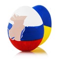 Two Easter eggs painted in color of flags of Russia and Ukraine on white background, closeup Royalty Free Stock Photo