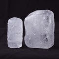 Two ecologic deodorant crystal in black background