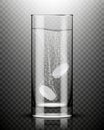 Two effervescent tablets in glass of water