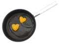 Two egg yolk heart-shape Royalty Free Stock Photo