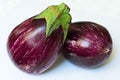 Two eggplants isolated on a white background. Close-up. Royalty Free Stock Photo