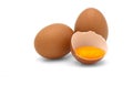 Eggs and a half of chicken egg with yolk in egg shell  on white background Royalty Free Stock Photo