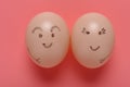 two eggs with smiling faces horizontal Royalty Free Stock Photo