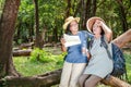 Two elderly Asian women trekking Feeling tired and hot.