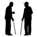 Two elderly men with cane standing and talking to each other