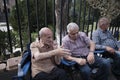 Two elderly Protestants are talking enthusiastically about something