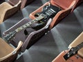 At intermission, rock guitarists laid their guitars parallel to each other on different rows in the auditorium Royalty Free Stock Photo