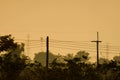 Two electric poles in evening sky Royalty Free Stock Photo