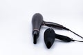 Two hair dryers on the white background with copy space Royalty Free Stock Photo