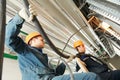 Two electrician workers at cabling Royalty Free Stock Photo