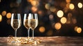 Two elegant glasses of champagne or sparkling wine Prosecco on a dark background with golden bokeh. Holiday concept Royalty Free Stock Photo