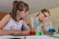 Two elementary school girls in chemistry class Royalty Free Stock Photo