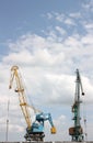 Two elevating cranes Royalty Free Stock Photo