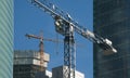 Two elevating cranes Royalty Free Stock Photo