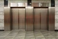 Two elevators with metal doors