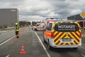 Emergency response vehicles parked adjacent to a fire truck on a street Royalty Free Stock Photo