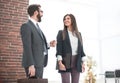 Two employees talking standing in the office Royalty Free Stock Photo