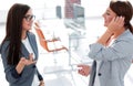 Two employees talking standing in the office Royalty Free Stock Photo