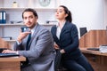 Two employees working in the office Royalty Free Stock Photo