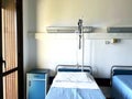 two empty beds in a hospital room Royalty Free Stock Photo
