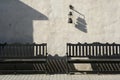 Two empty benches in sunlight Royalty Free Stock Photo