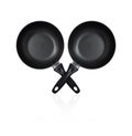Two empty black iron steel cookware pan with black handle combine in X shape, die cut isolated with clipping path on white Royalty Free Stock Photo