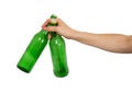 Two empty bottles of beer in a female hand Royalty Free Stock Photo