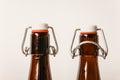 Two empty Brown bottles with lids Royalty Free Stock Photo