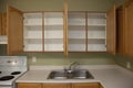 Two empty cupboards and a kitchen sink Royalty Free Stock Photo