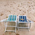 Two empty deck chairs on the beach, Summer holiday concept Royalty Free Stock Photo