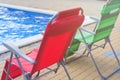 Two empty deck chairs at the pool Royalty Free Stock Photo