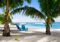 Two empty deckchairs on beach, Upolu Island, Samoa, South Pacific Royalty Free Stock Photo