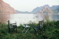 Two empty camping chairs in Lofoten, Norway