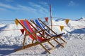 Two empty folding chairs on top of mountain