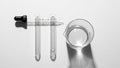 Test tubes are placed side by side on a smooth surface with a Royalty Free Stock Photo