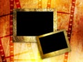 Two empty photo frames on film strip background