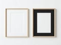 Two empty picture frames on a white wall Royalty Free Stock Photo