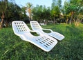 Two empty plastic chairs in park. Recreation Royalty Free Stock Photo