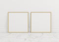 Double 10x10 Square Gold Frame mockup on marble floor and white wall