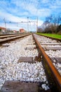 Two empty railway lines joining in the distance Royalty Free Stock Photo