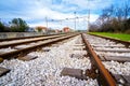 Two empty railway lines joining in the distance Royalty Free Stock Photo